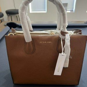 Michael Kors Brand New with tags purse. Tan color.
